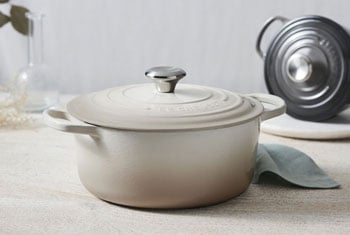 cream colored dutch oven on a counter