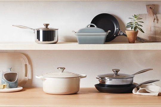 light green and cream colored cookware