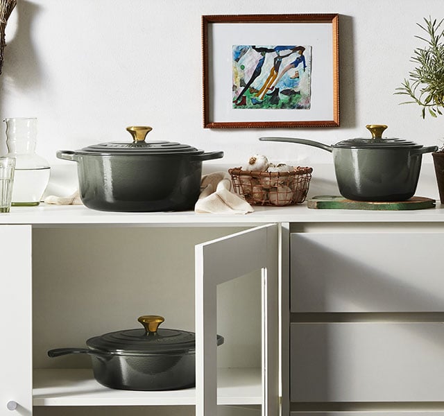 thyme cookware on a sideboard