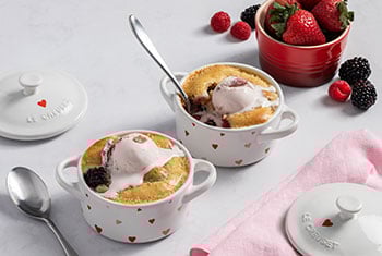berry cobblers baked in mini cocottes with a heart pattern