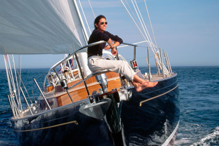woman sailing on a sailboat