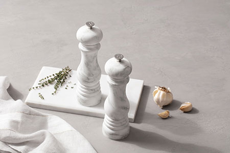 salt and pepper mills with a marble pattern