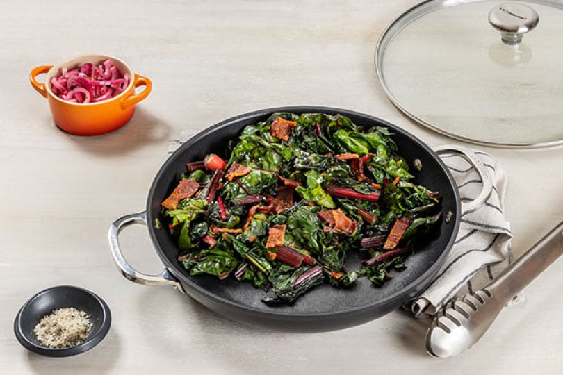 Smoky Braised Swiss Chard with Crispy Bacon and Pickled Onions