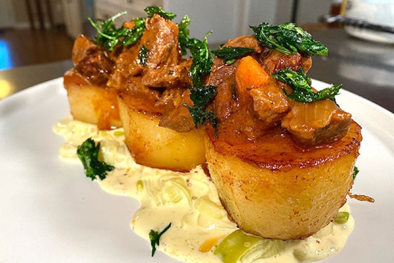 Slow Braised Beef Stew with Fondant Potatoes and Creamed Leeks